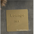 Hotel Siy twalèt pòt Ada Braille Siy